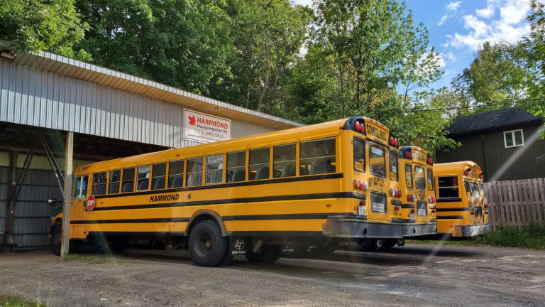 Local Catholic schools return to shared bus service